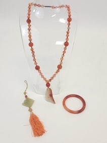 CARNELIAN NECKLACE & BANGLE, AND A JADE MEDALLION