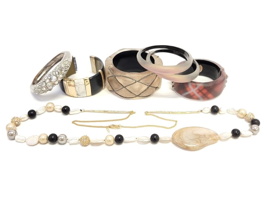 LOT SEVEN PIECES ALEXIS BITTAR JEWELRY: LOT SEVEN PIECES ALEXIS BITTAR JEWELRY: One gold tone necklace with pearls, pave crystal encrusted beads, black beads and a large marbled resin accent piece (overall length 37"), six bangles: one quil