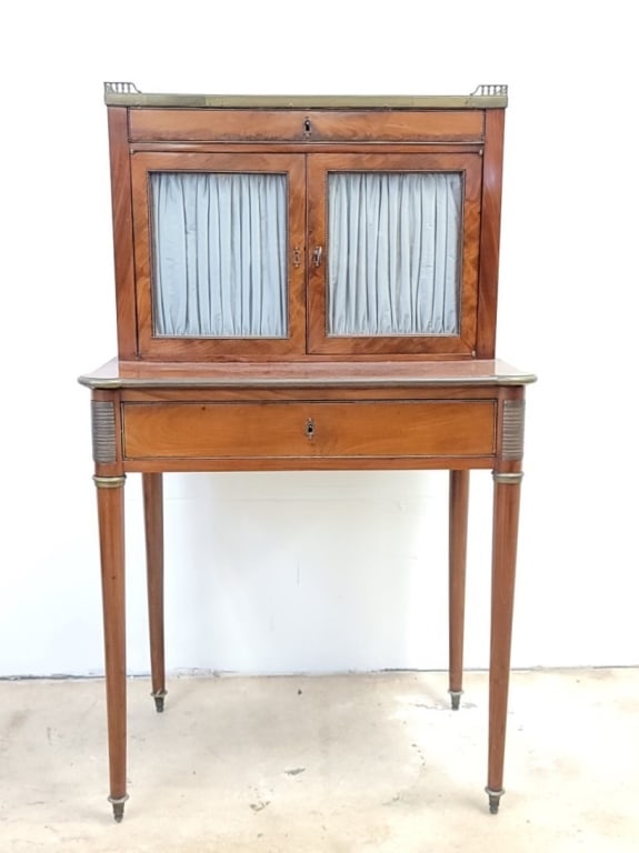 19TH C ENGLISH LOUIS XVI STYLE BONHEUR DU JOUR DES: An English 19th century Louis XVI style bonheur du jour in the French taste. Figured flame / burl mahogany finish with brass-galleried carrera marble top , brass beaded trim borders, silk-paneled cabi