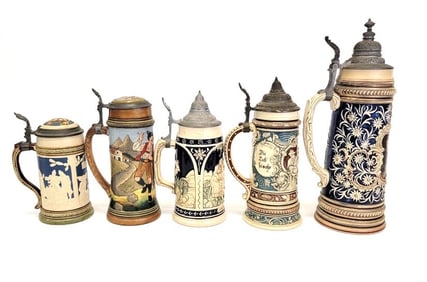 FIVE ANTIQUE GERMAN BEER STEINS