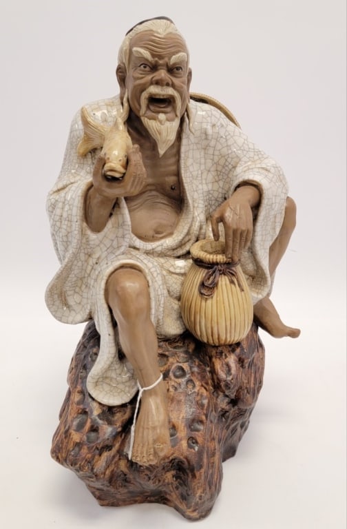 LARGE JAPANESE "MUD MAN" POTTERY SCULPTURE: Large Japanese "Mud man" pottery sculpture of a man. Measures 18.75" tall. Unsigned. Condition if good with only normal signs of age, see images. Weight: approx. 15 lbs. Provenance: From the former in