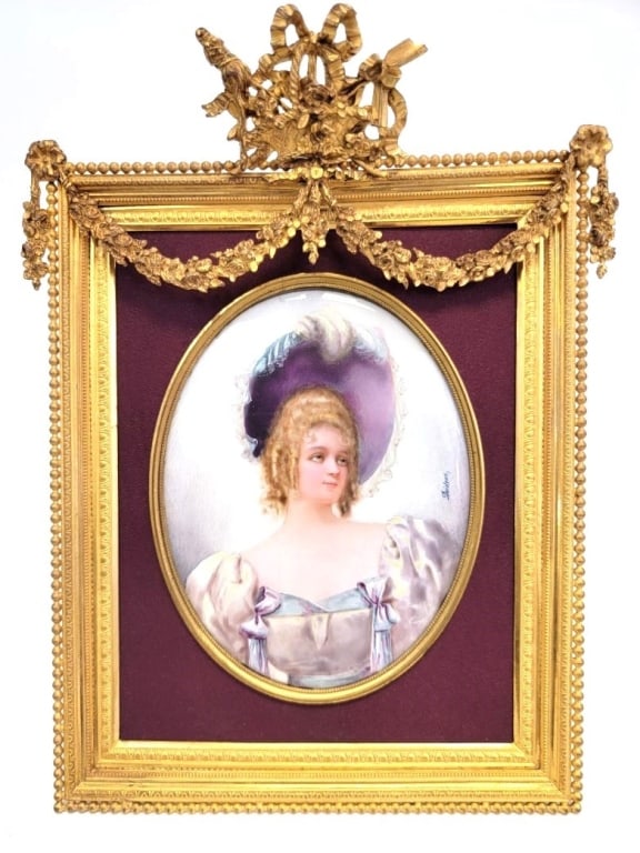 ANTIQUE PORTRAIT OF A LADY IN GILT BRONZE FRAME: Antique portrait of a lady on bone panel, framed under convex glass in an elaborate Neoclassical style gilt bronze frame with purple fabric matting. Frame measures a total of 10.5" tall x 8" wide and 