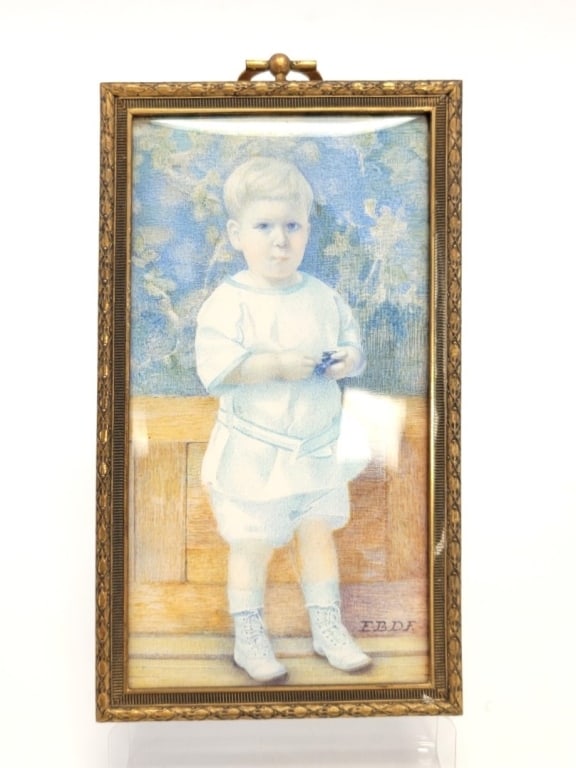 ANTIQUE MINIATURE PAINTING OF A YOUNG BOY: Antique miniature painting on bone depicting a young boy in blue. Signed "EBDF" lower right. Under convex glass in a gilt bronze frame measuring a total of 6.75" tall x 3.6" wide and .5" thick. Condit