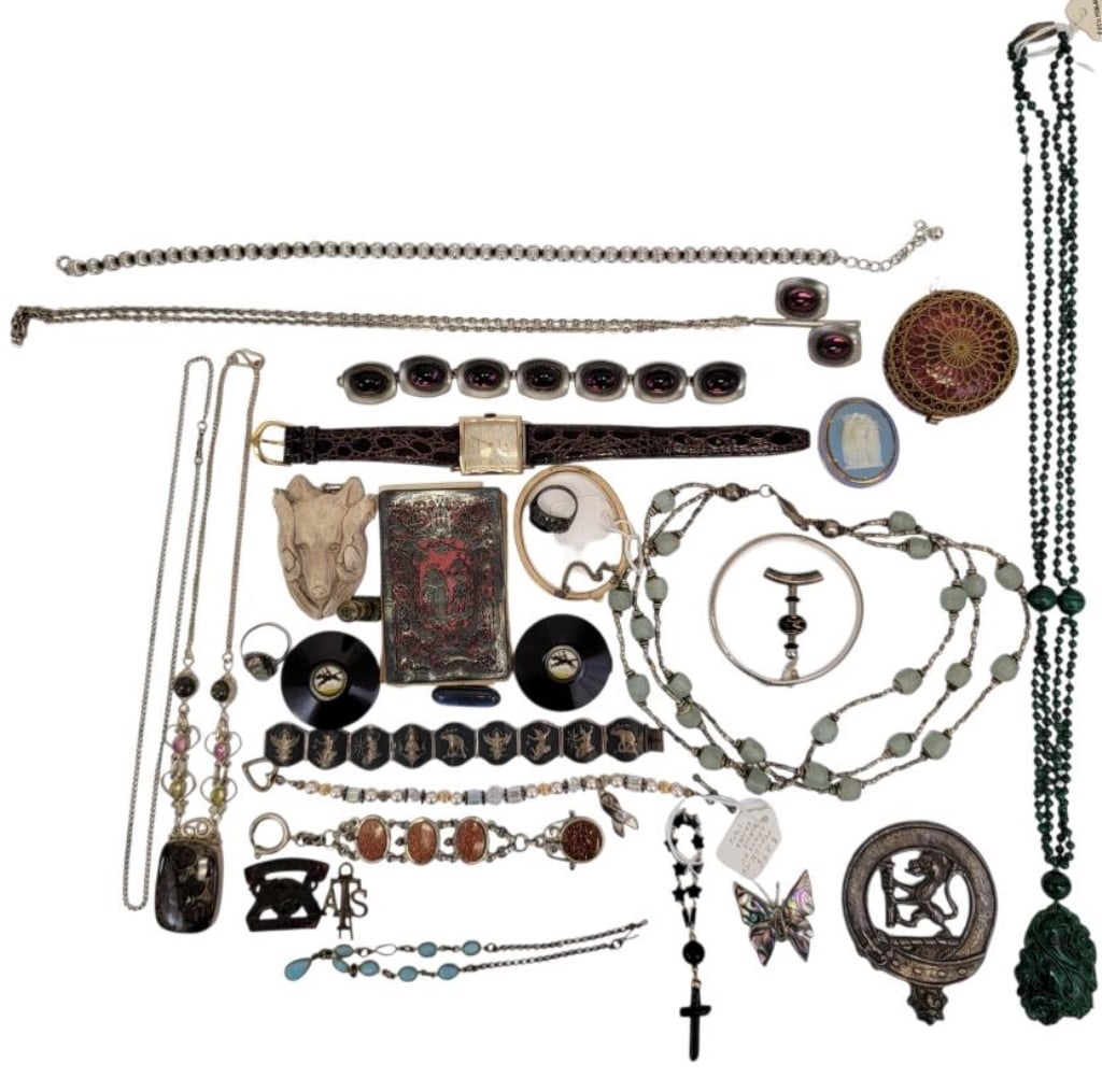 ASSORTED VINTAGE & ANTIQUE JEWELRY: Assorted vintage and antique jewelry, etc. Includes sterling, gold tones, silver tones, carved malachite, Jorgen Jensen pewter and purple glass bracelet and necklace set, a jet glass mourning chain,