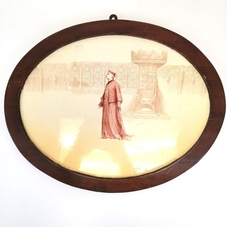 ROYAL DOULTON CARDINAL WOLSEY TRANSFERWARE PLAQUE: Antique Royal Doulton Cardinal Wolsey transferware plaque in a plain wooden frame measuring 18.25" wide x 14.25" tall. Marked on backside. Condition: plaque glued into frame, minor blemishes and wear
