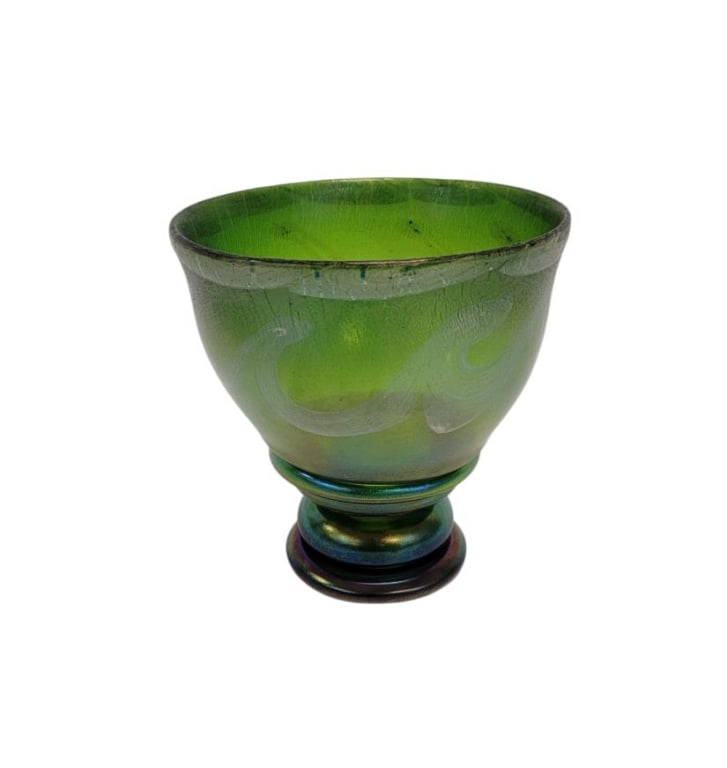 EARLY DALE CHIHULY GREEN IRIDESCENT GLASS VASE: Early Dale Patrick Chihuly (American, b. 1941) green iridescent footed glass vase. Measures about 7.75" tall x 7.75" diameter. Unsigned. Accompanied by certificate of authenticity by Robert Millis