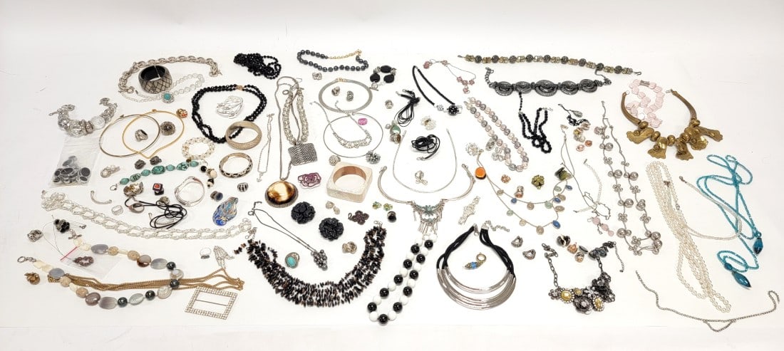 HUGE COLLECTION LADIES COSTUME JEWELRY: Huge collection of assorted ladies costume jewelry. Mostly silver and black tones. Includes various designer brands - necklaces, bracelets, rings, earrings and more. Also includes a wide variety of