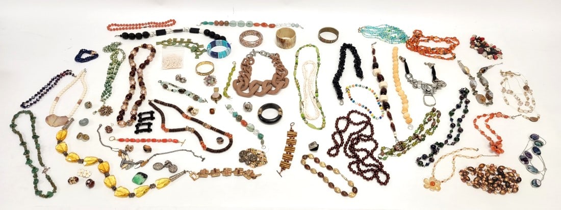 HUGE COLLECTION LADIES COSTUME JEWELRY: Huge collection of assorted ladies costume jewelry. Includes various designer brands - necklaces, bracelets, rings, earrings and more. Also includes a wide variety of materials such as mother of