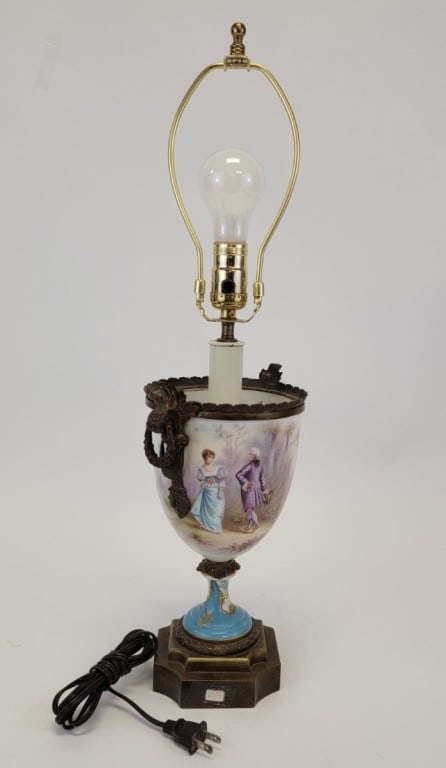 2 ANTIQUE PORCELAIN TABLE LAMPS, SEVRES STYLE ETC: Lot of two antique porcelain and bronze table lamps. The first is a Sevres style (possibly is Sevres, did not disassemble to examine for marks) scenic painted urn mounted as a lamp, measuring a total 