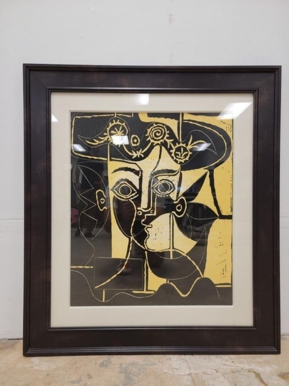 FRAMED PRINT AFTER PICASSO, GRANDE TETE DE FEMME..: Framed print after Picasso, Grande Tete de Femme au Chapeau Orne. Frame measures a total of 34" tall x 30.25" wide and 1.25" thick. Visible image measures 23.25" tall x 19.5" wide. Unsigned.
