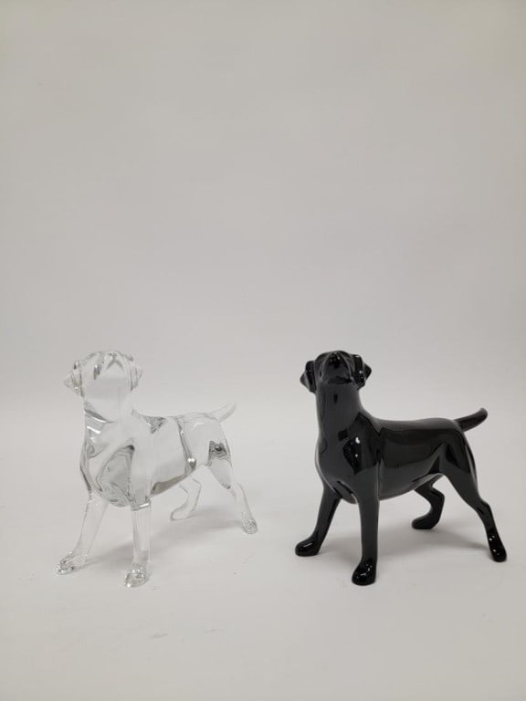 TWO BACCARAT CRYSTAL LABRADORS, BLACK & CLEAR: Lot of two Baccarat crystal labrador retreivers. One black glass and one clear. Both signed on foot. Each one measures 5.35" tall x 6.75" long. Condition: good, no chips or cracks, see images. Weight: