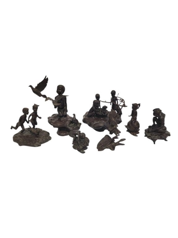 LOT SEVEN MIA & BOB KRANTZ CAST BRONZE SCULPTURES: Collection of seven Mia & Bob Krantz cast bronze sculptures. Each one depicting children at play. Each sculpture is signed and numbered near the base. Tallest is the sculpture with young boy and birds