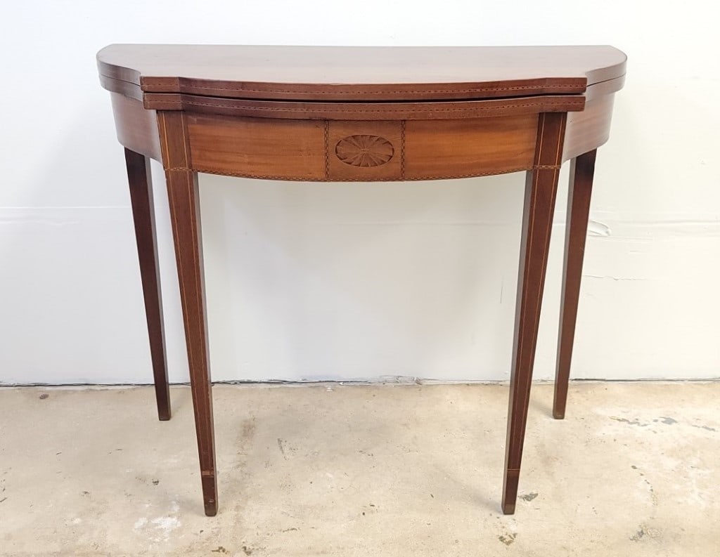 19TH C FEDERAL STYLE FLIP TOP DEMILUNE CARD TABLE: Antique 19th century Federal style flip top mahogany demilune card table with parquetry inlay and banding on the top, apron, and legs. Measures a total of 30.5" tall x 36.25" wide x 17.75" deep (with 