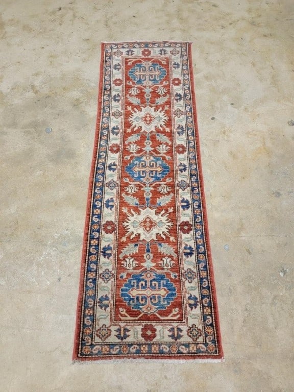 VINTAGE HAND-KNOTTED TURKISH WOOL RUG 2'3" X 7'3": Vintage hand-knotted Turkish wool rug measuring 2'3" x 7'3". Condition: small repair to one corner, overall minor signs of age and use, see images. Weight: 10 lbs.