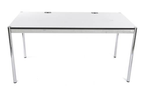 SET OF FOUR USM HALLER OFFICE DESKS: With white laminate tops and chrome legs. Each, 29 1/2 by 59 by 29 1/2 inches Categories: Tommy Hilfiger