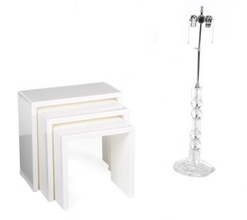 WHITE LAMINATE NESTING TABLES: A group of three white laminate nesting tables, together with a clear block and sphere table lamp. Categories: Tommy Hilfiger