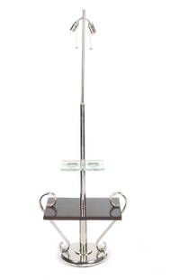 ART DECO STYLE TABLE LAMP STAND: A two-light chrome, wood and mirrored glass table lamp stand in an Art Deco style. 64 1/2 by 23 by 14 inches Categories: Tommy Hilfiger