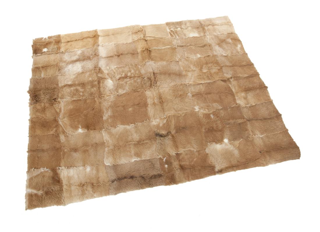 TWO PATCHWORK HIDE AREA RUGS (1 of 2)