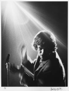 GERED MANKOWITZ (BRITISH, B. 1946): Mick Jagger, silver gelatin print, signed lower right, edition number 19/150. Together with another unsigned vintage black and white photographic print of Mick Jagger performing in a jumpsuit.  Largte