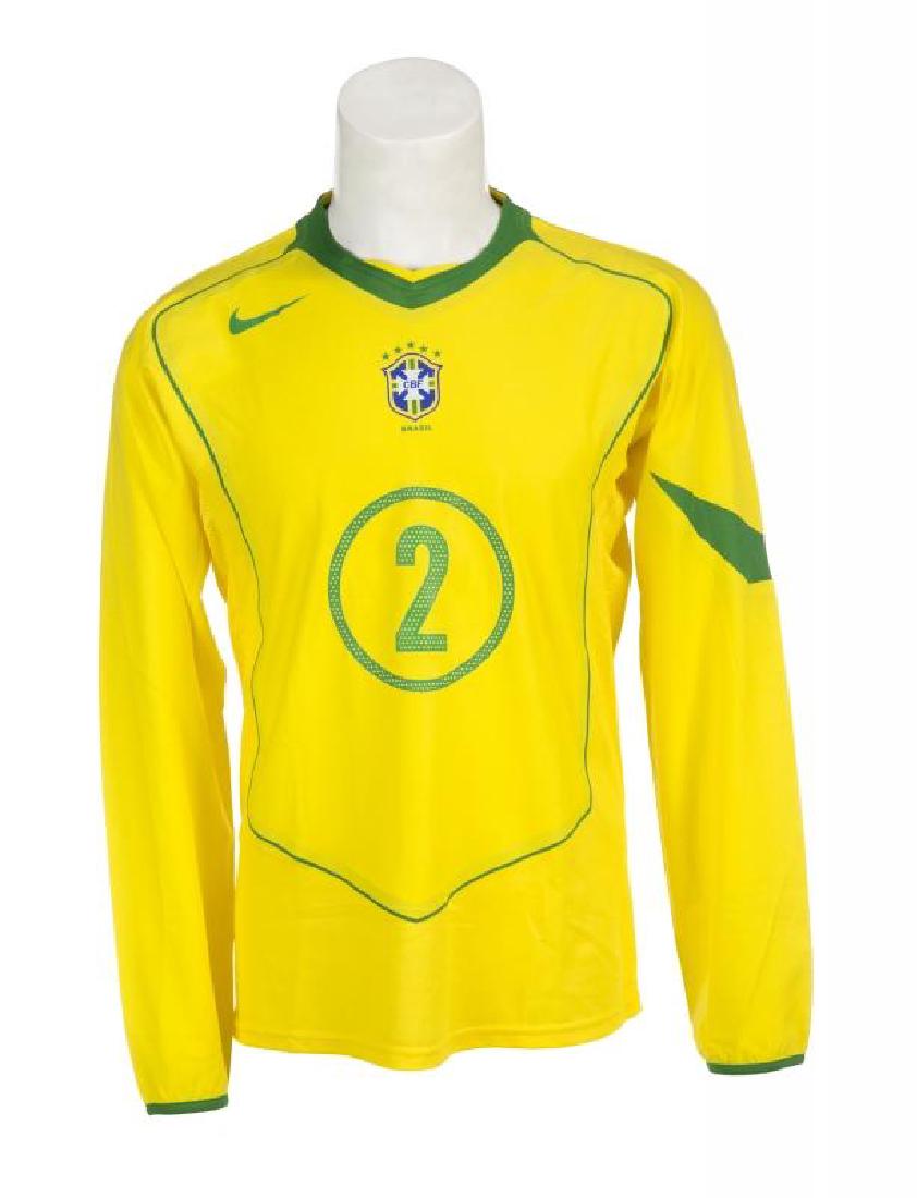 CAFU 2004 BRAZIL MATCH WORN JERSEY: A Nike Brazil national football team long-sleeve jersey match worn by Marcos Evangelista de Morais, known simply as Cafu. The yellow jersey features the Brazilian Football Confederation (CBF) crest ap