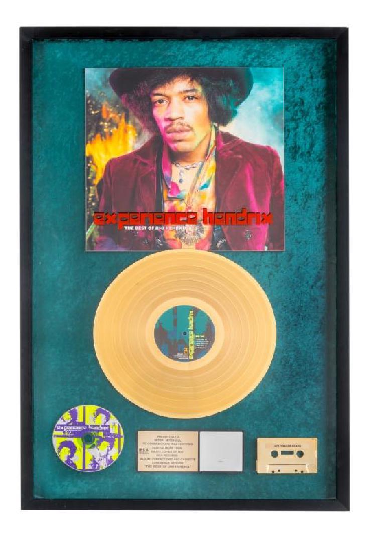 MITCH MITCHELL THE BEST OF JIMI HENDRIX RECORD AWARD: An RIAA-certified “gold” record award presented to Mitch Mitchell to commemorate the sale of more than 500,000 copies of the MCA album, compact disc and cassette Experience Hendrix: The Best of Ji