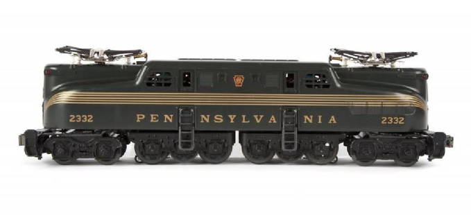 LIONEL 6-18314 CENTURY CLUB "2332" PRR GG-1 LOCOMOTIVE: Locomotive has been run. Features Light, Smoke, RailSounds, Gold plated accents, and TMCC (TrainMaster Command Control). There is a scratch on the roof. Boxed. The box is faded. Excellent. 