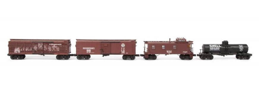LIONEL DIE-CAST SCALE FREIGHT CARS 4-PACK: Cars have been run. Includes 6-51300 Shell single dome tank car, 6-51401 PRR boxcar, 6-51402 C&O stock car, and 6-51701 NYC caboose. No boxes. Excellent. PROVENANCE From the Collection of Neil Young