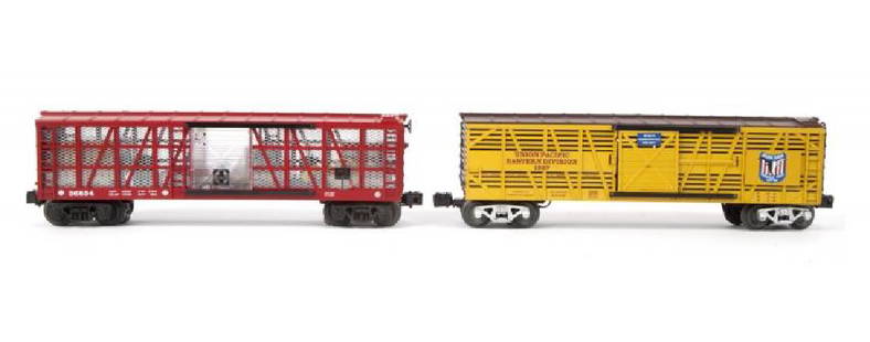 LIONEL 6-29305 CHISHOLM TRAIL STOCK CAR, 6-36834 SANTA: Cars have been run. 29305 has cattle and other sounds. 36834 is lighted and has removable loads. No boxes. Excellent. PROVENANCE From the Collection of Neil Young