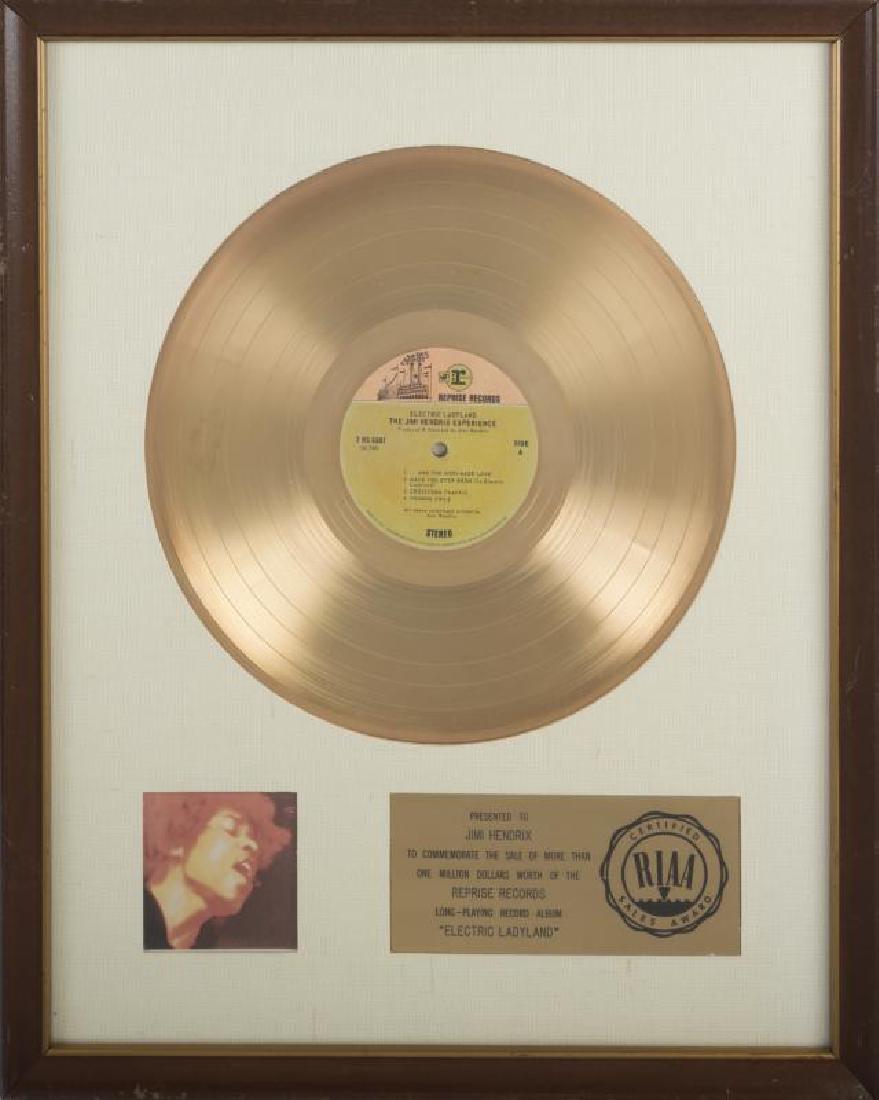 JIMI HENDRIX WHITE MATTE RECORD AWARD: Request condition report! An RIAA-certified record award, white linen matte, presented to Jimi Hendrix to commemorate the sale of more than $1 million worth of the Reprise Records long-playing record