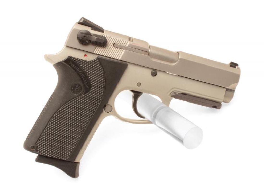 JERRY LEWIS SMITH & WESSON: A Smith & Wesson “Tactical” model 3913TSW semi-auto pistol in 9mm, serial number VJB5088. Excellent in box. 3 mags. This gun cannot be picked up by or shipped to California residents. PROVENANCE F