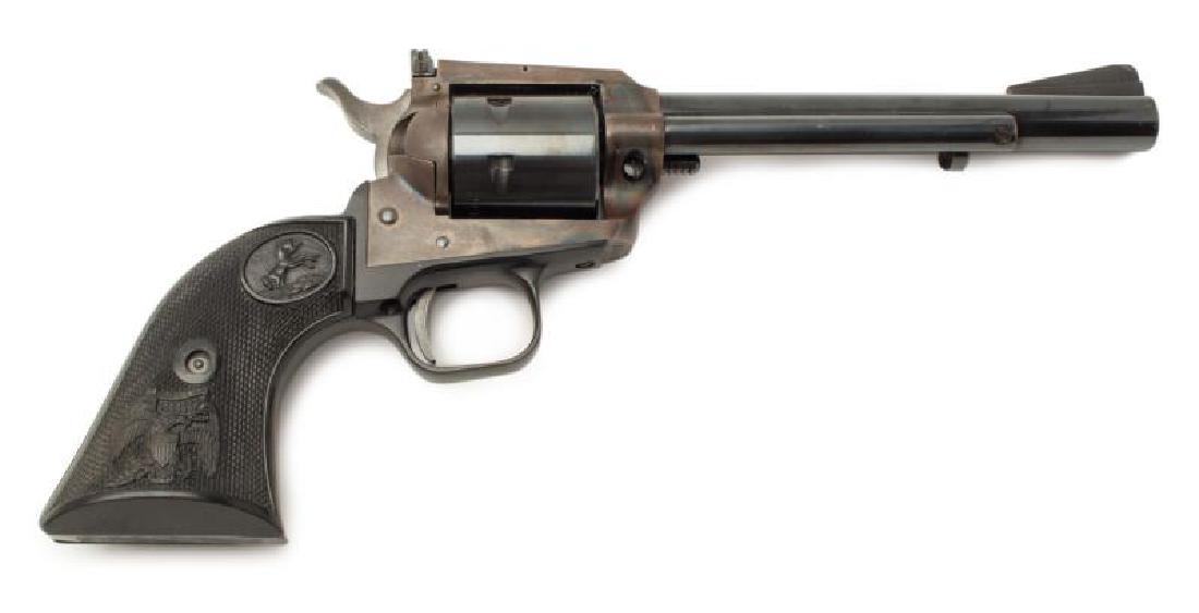 JERRY LEWIS COLT: A Colt New Frontier Single Action revolver in .22 caliber with blue and case hardened finish, serial number L18500. Excellent condition. PROVENANCE From the Estate of Jerry Lewis Jerry Lewis