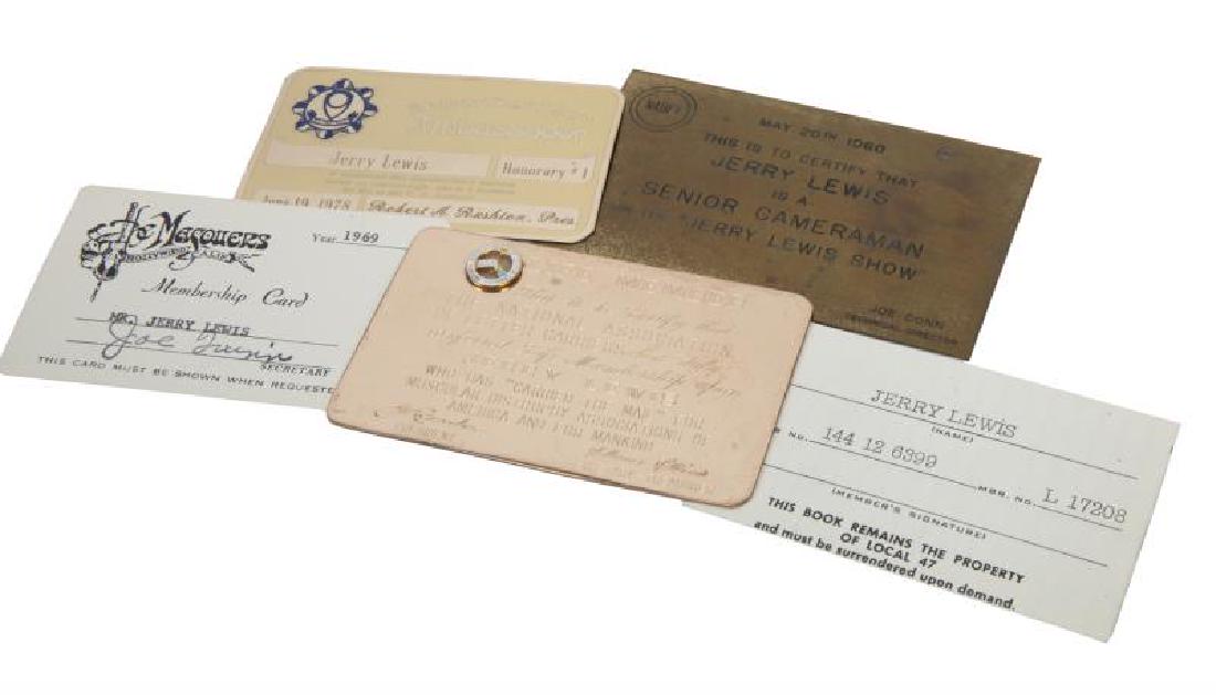 JERRY LEWIS MEMBERSHIP CARDS AND PLAQUE: A group of four membership cards and a plaque in the name of Jerry Lewis. The group includes a paper Musicians Union Local 47 card in the name of Lewis from 1963; a paper membership card for The Masqu