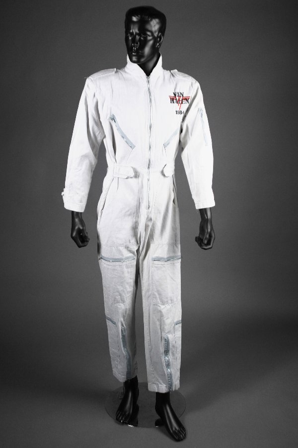 Eddie Van Halen 1984 Owned and Worn Jumpsuit: "Warner Brothers, 1984 Custom fitted grey cotton jumpsuit by Nomura (California), size small, having customized embroidery reading "Van Halen, 1984" over Van Halen logo at top left chest area, several