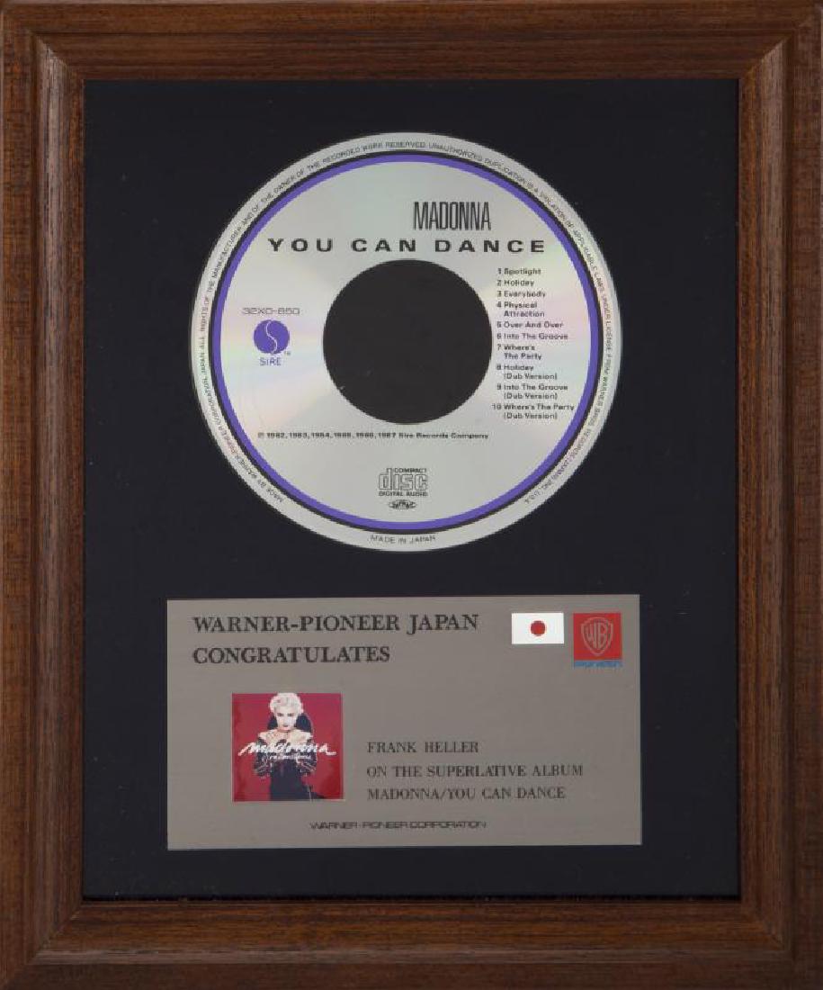 MADONNA JAPANESE RECORD AWARD: A Warner-Pioneer Japan record award presented to DeMann Entertainment Co. and Frank Heller for the superlative album Madonna / You Can Dance, contained in a presentation box. Box, 12 by 10 inches Mado