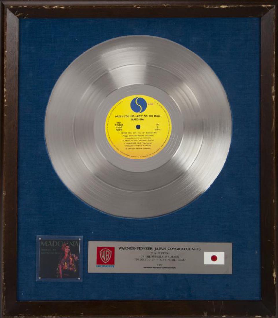 MADONNA JAPANESE RECORD AWARD: A Warner-Pioneer Japan record award presented to Warner Bros. executive Tom Ruffino for the 1987 superlative album Dress Yu Up - Ain't No Big Deal. 19 1/2 by 17 inches Madonna