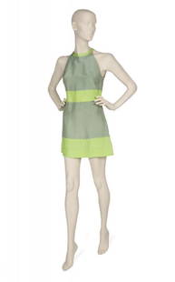 SHARON TATE CUSTOM-MADE DRESS: A custom-made mint green slubbed silk dress attributed as being made by William Travilla. The mini dress has a lime green halter neckline, inset waistband and trim. Some hand finishing work is present