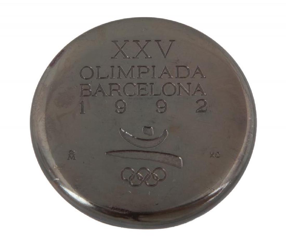 1992 BARCELONA OLYMPICS PARTICIPATION MEDAL: A 1992 Barcelona Olympics participation medal made of burnished copper and designed by Xavier Corberó, a Catalan sculptor best known for his monumental sculptures in Barcelona and cities worldwide. C