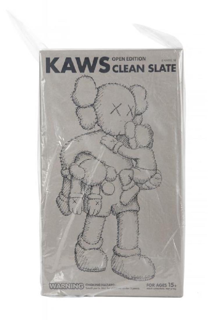 KAWS (American, 1974): Clean Slate (brown) - 2018 Cast vinyl figure Sealed in original box with original shipping box included 16 1/2 by 9 1/2 by 8 1/2 inches (overall) Kaws