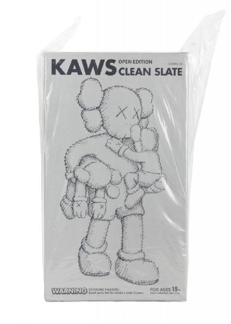 KAWS (American, 1974): Clean Slate (grey) - 2018 Cast vinyl figure Sealed in original box with original shipping box included 16 1/2 by 9 1/2 by 8 1/2 inches (overall) Kaws
