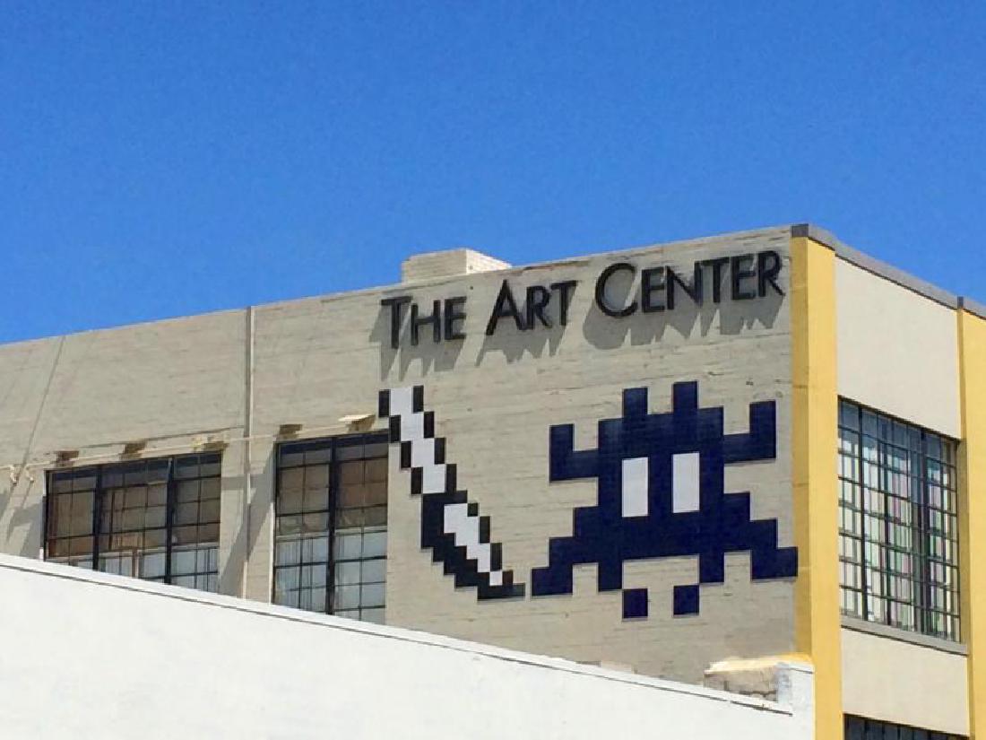 INVADER (French, 1969): SD_10 (aka The Mothership) - 2010 Tile mosaic mural on building façade Executed in the Summer of 2010 on the façade of the Art Center Building in San Diego, this monumental tile mosaic by Invader wa