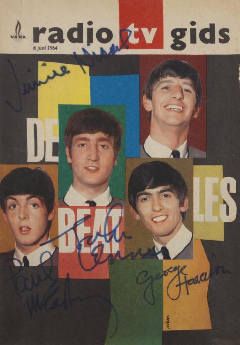 THE BEATLES AND JIMMIE NICOL SIGNED RADIO AND TV GUIDE: A copy of Dutch VARA Radio TV Gids magazine from June 6, 1964, signed on the cover in blue marker by John Lennon, Paul McCartney, George Harrison, and stand-in drummer Jimmie Nicol. The signatures wer
