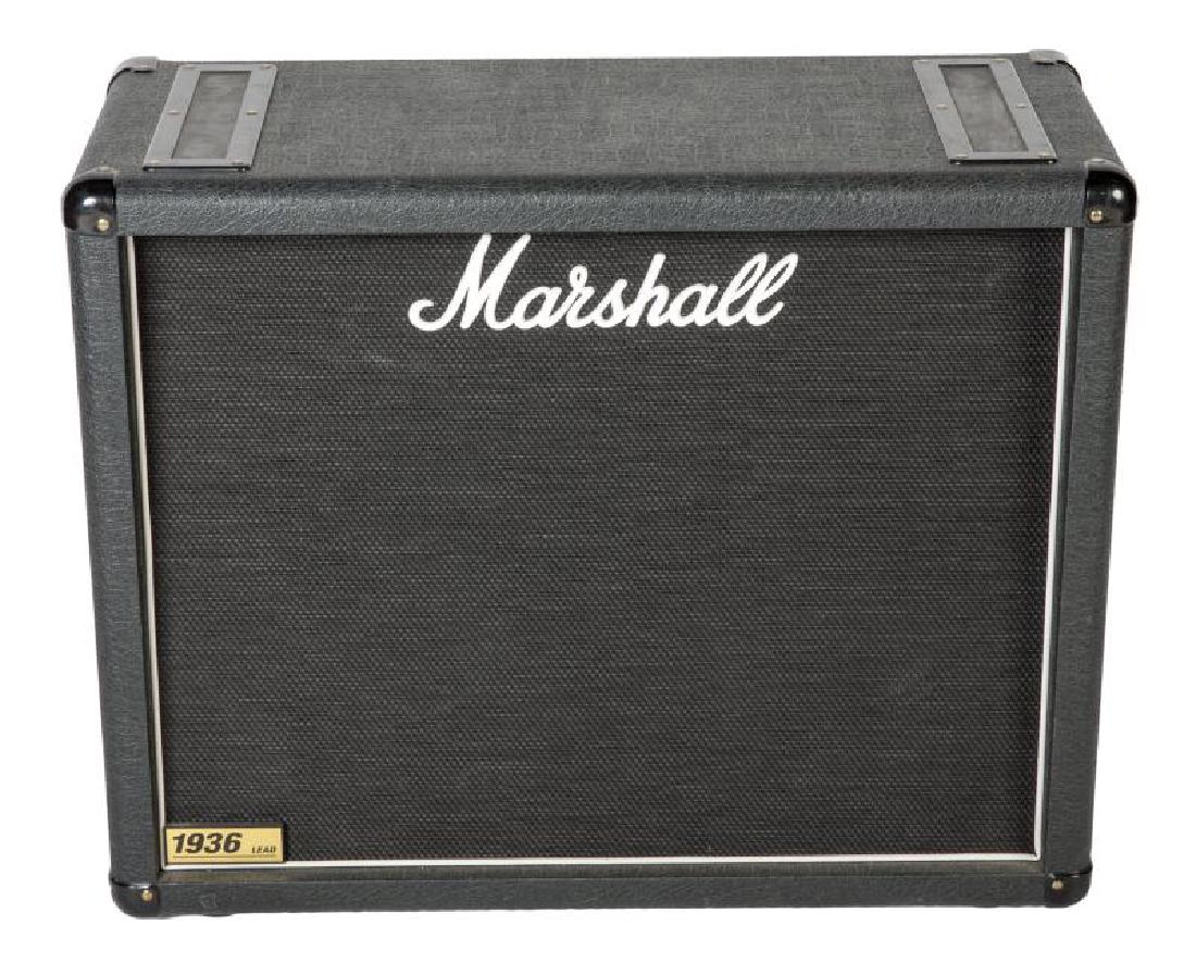 GREG LAKE MARSHALL SPEAKER CABINET: A 2X12 extension cabinet, serial number M-2004-27-0987-Z. 23 1/2 by 28 by 12 inches PROVENANCE From the Estate of Greg Lake Greg Lake