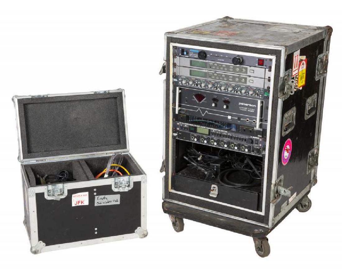 GREG LAKE GUITAR RACK MODULES: A pair of Samson UR6D wireless units, a BSS DPR-901 equalizer, a Peterson R450 strobe tuner, a Korg DT-1 Pro digital tuner, a TC Electronics TC 1128 equalizer, a Rane HC6 headphone amp, all mounted wi