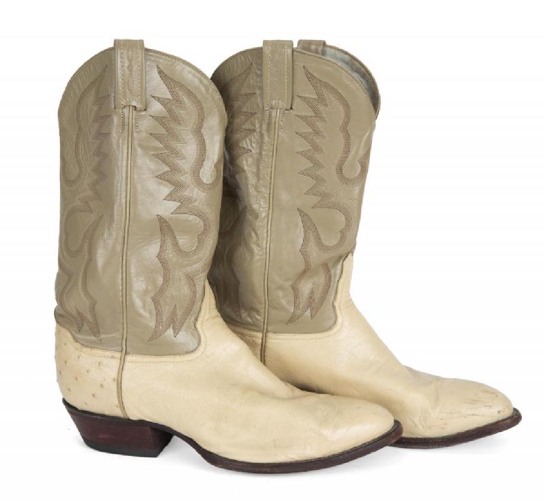 BURT REYNOLDS TWO-TONED COWBOY BOOTS: A pair of cream colored leather boots with taupe colored upper. Made by Tony Lama, size 10 1/2 EE.; PROVENANCE From the Estate of Burt Reynolds; Burt Reynolds