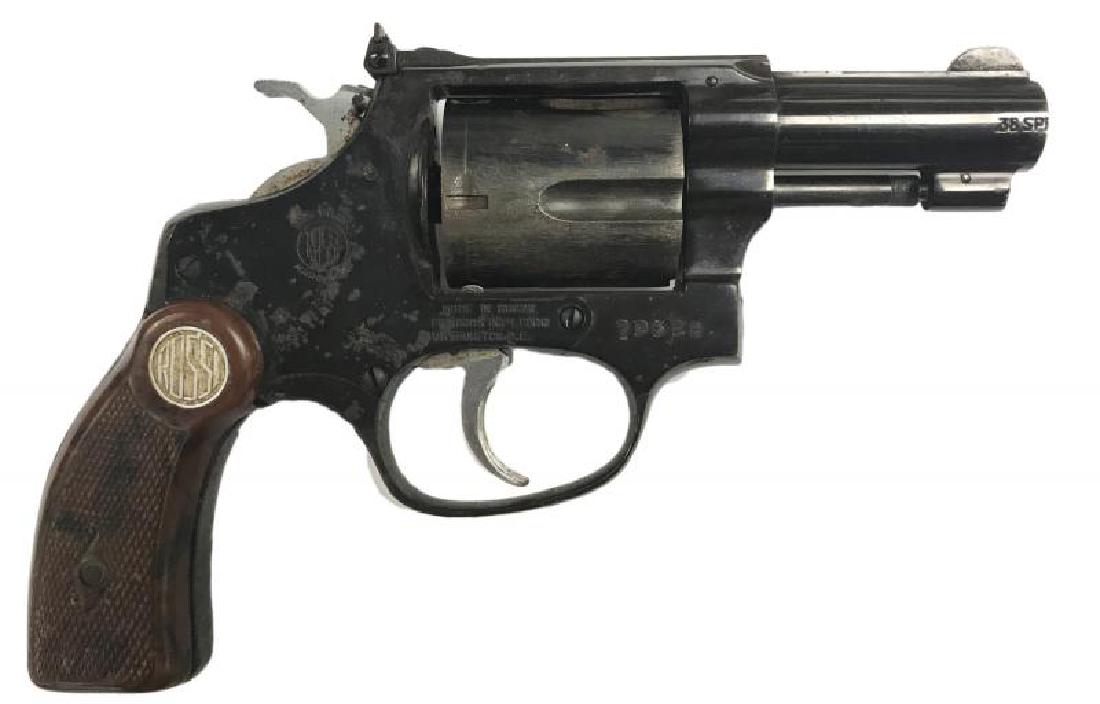 BURT REYNOLDS B.L. STRYKER ROSSI .38 SPECIAL REVOLVER: A piece with the barrel shortened to 2 3/8Â” and sights added, shows holster wear and rust, good bore and action, S/N 79628, with custom-made Bohlin holster with basket weave design and initials Â