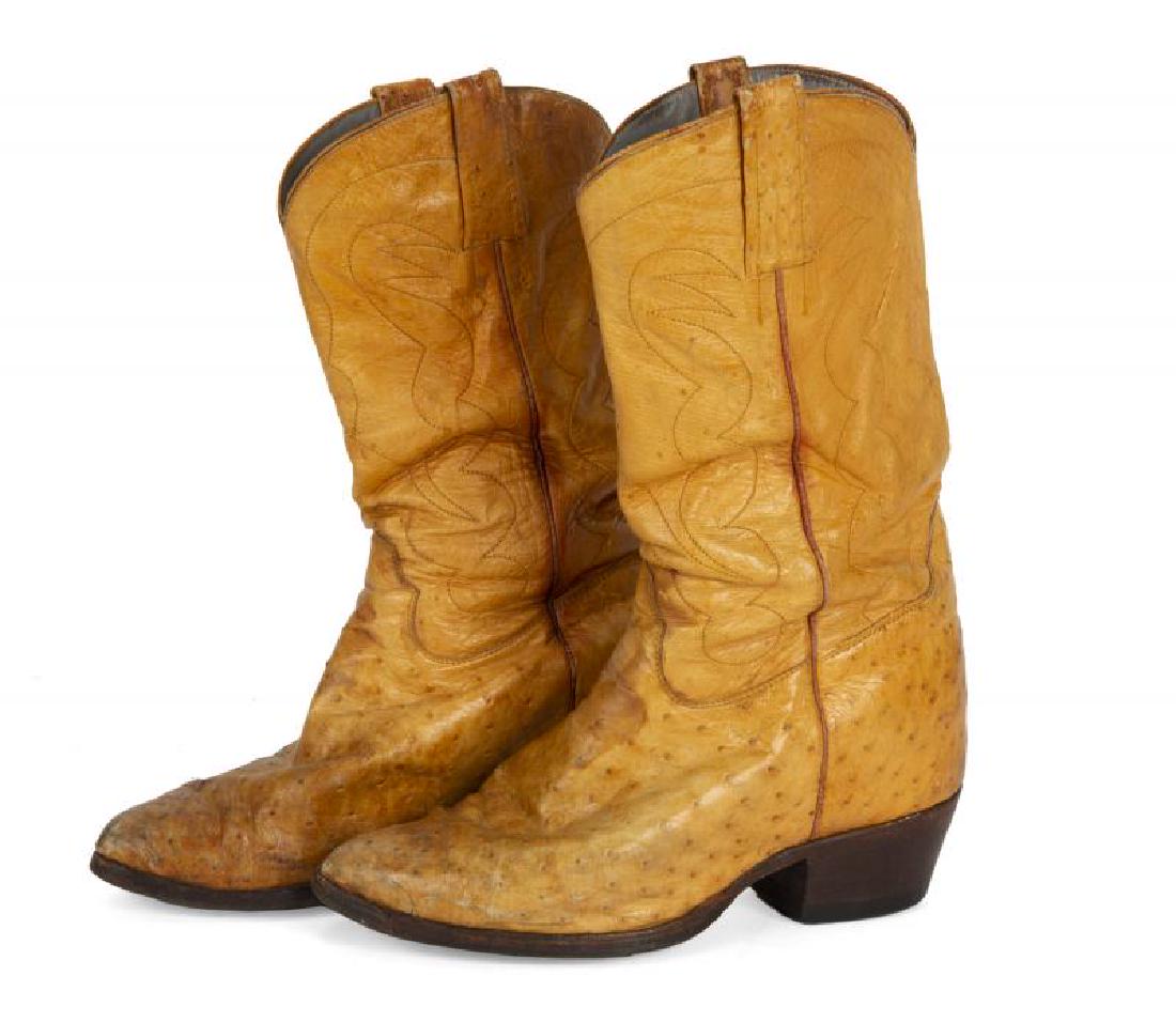 BURT REYNOLDS OSTRICH COWBOY BOOTS: A pair of tan ostrich leather boots by Manuel. Fitted with custom lift inserts, no size apparent.; PROVENANCE From the Estate of Burt Reynolds; Burt Reynolds
