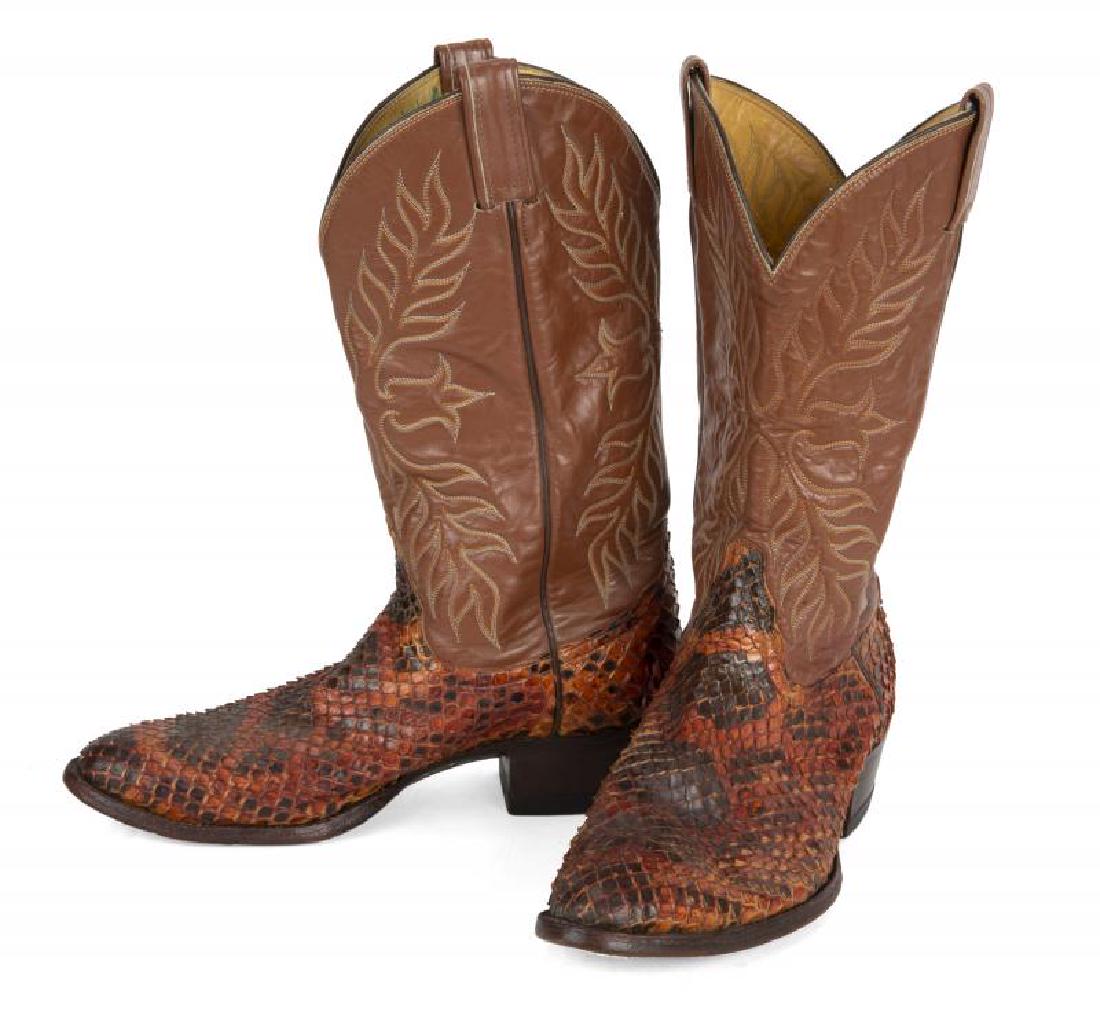 BURT REYNOLDS SNAKESKIN COWBOY BOOTS: A pair of brown snakeskin cowboy boots made by Tony Lama, size 9 1/2 D.; PROVENANCE From the Estate of Burt Reynolds; Burt Reynolds