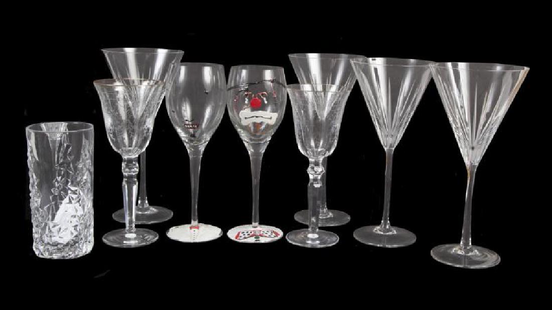 JERRY LEWIS ASSORTED STEMWARE: A group of stemware including a set of four cut martini glasses, two gilt rim Waterford wine glasses, and two handpainted clown wine stems (one effaced). Together with a Nachtmann tumbler engraved to