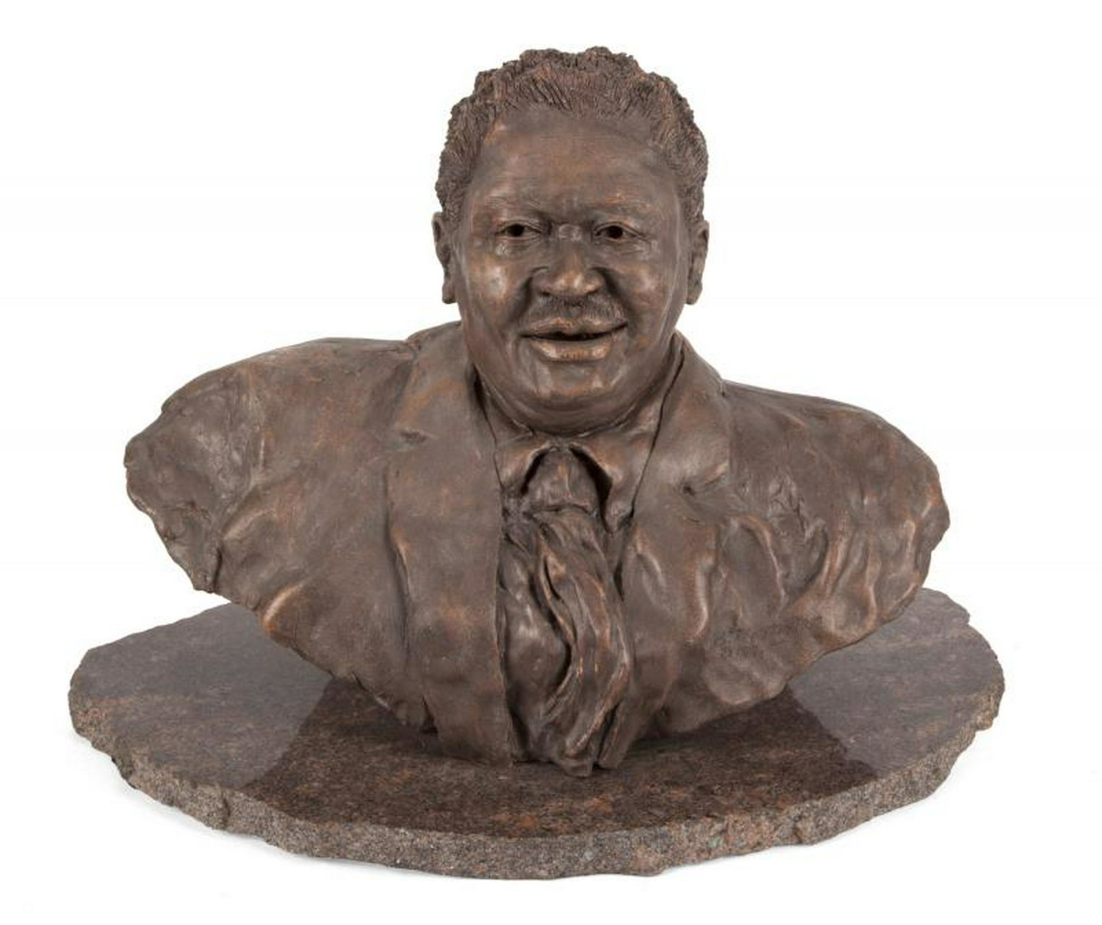 B.B. KING CLAY PORTRAIT BUST: A portrait bust of B.B. King mounted to a granite base, signed "B. Momgen," lower right and dated 1991. PROVENANCE From the Estate of B.B. King BB King