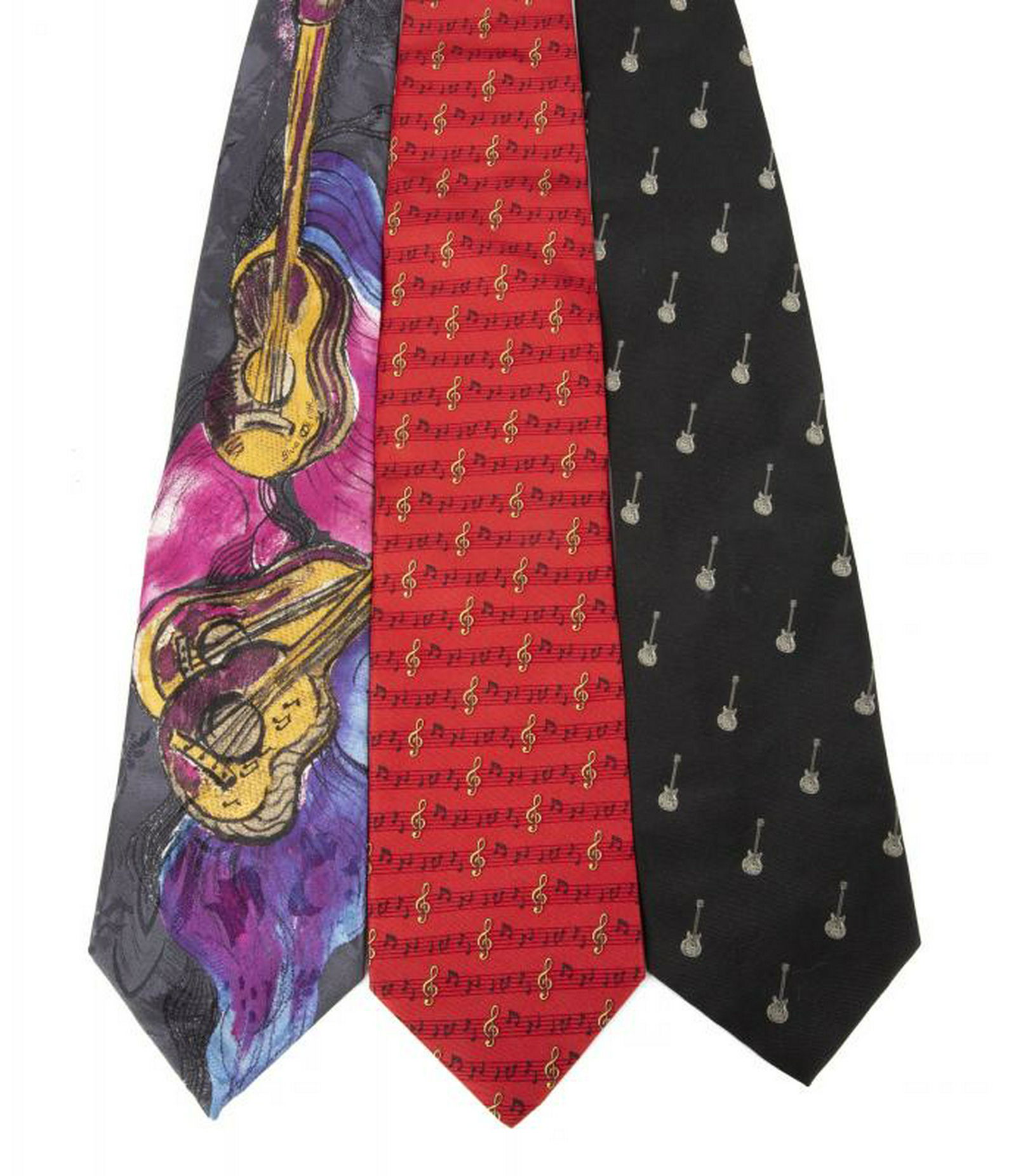 B.B. KING MUSICAL TIES: A group of three ties: the first is in black and white with guitar motifs by DKNY; the second is a red tie with treble clef and musical notes by Beaufort Tie Rack; and the third is a colorful tie with